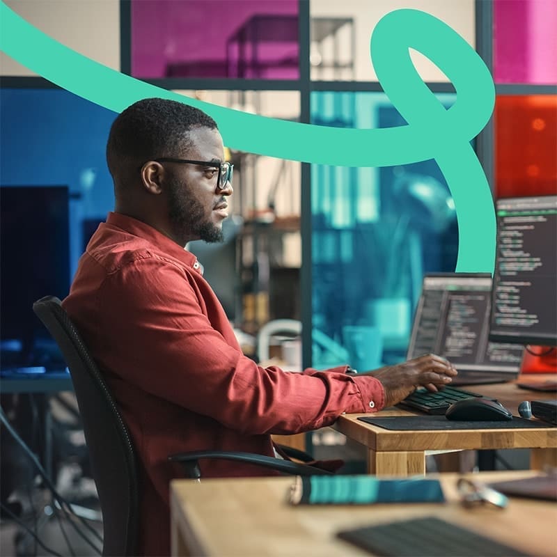 idmtc man working at computer
