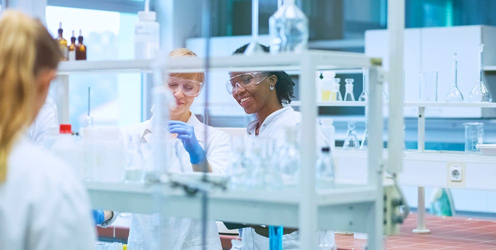 two women in a lab